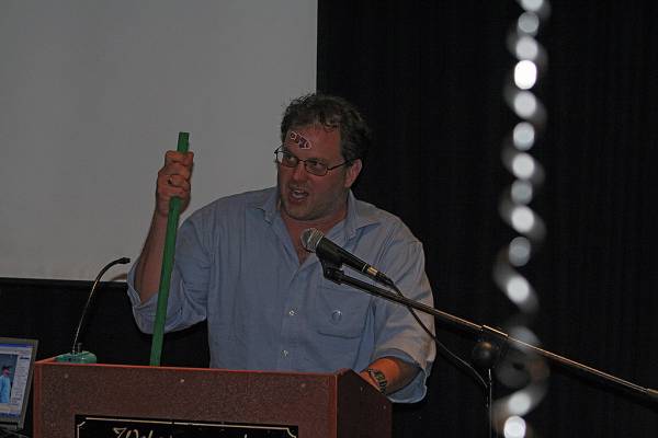 Andrew Loch and his DSTC Lolly Fish Pinata stick,  | DSTC Farewell Symposium, 28 July 2005  | 