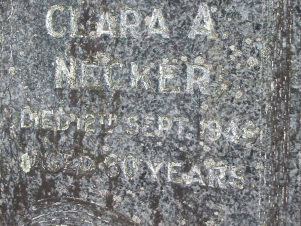 Wilhelm F.C. NECKER, husband father,  | died 28 June 1974? aged 88 years;  | Clara A. NECKER, wife mother,  | died 12 Sept 1948? aged 60 years;  | Alberton Cemetery, Gold Coast City  | 