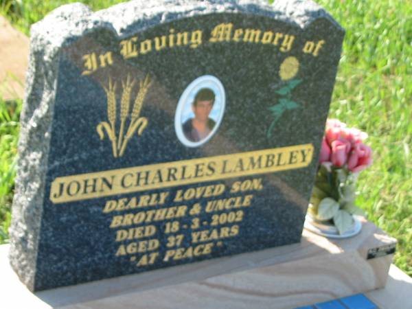 John (Jack) Charles LAMBLEY,  | son brother uncle,  | died 18-3-2002 aged 37 years;  | Bell cemetery, Wambo Shire  | 