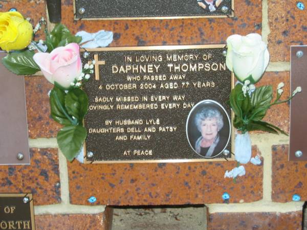Daphney THOMPSON,  | died 4 Oct 2004 aged 77 years,  | husband Lyle,  | daughters Dell & Patsy;  | Bribie Island Memorial Gardens, Caboolture Shire  | 