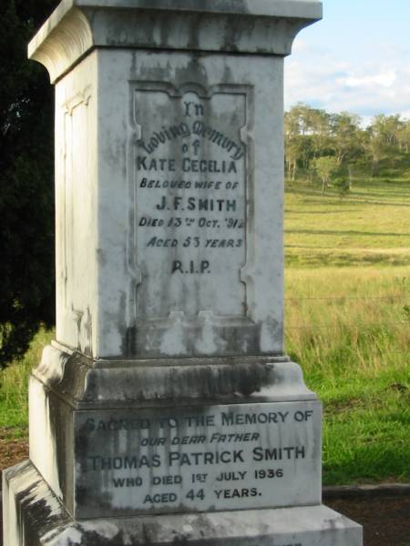 Kate Cecelia, wife of J.F. SMITH,  | died 13 Oct 1912 aged 53 years;  | Thomas Patrick SMITH, father,  | died 1 July 1936 aged 44 years;  | Susan, mother,  | died 6 Nov 1936 aged 42 years;  | Mary Alice SMITH,  | died 14 June 1887 aged 2 years;  | Michael Francis SMITH,  | died 15 Aug 1905 aged 28 years;  | Sacred Heart Catholic Church, Christmas Creek, Beaudesert Shire  | 