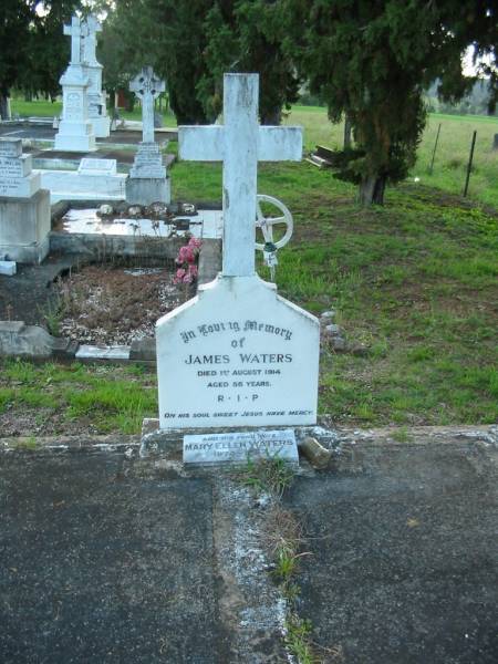 James WATERS,  | died 1 Aug 1914 aged 55 years;  | Mary Ellen WATERS, wife,  | 1874 - 1957;  | Sacred Heart Catholic Church, Christmas Creek, Beaudesert Shire  | 