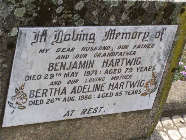 Benjamin HARTWIG,  | husband father grandfather,  | died 29 May 1971 aged 79 years;  | Bertha Adeline HARTWIG,  | died 26 Aug 1986 aged 85 years;  | Douglas Lutheran cemetery, Crows Nest Shire  | 