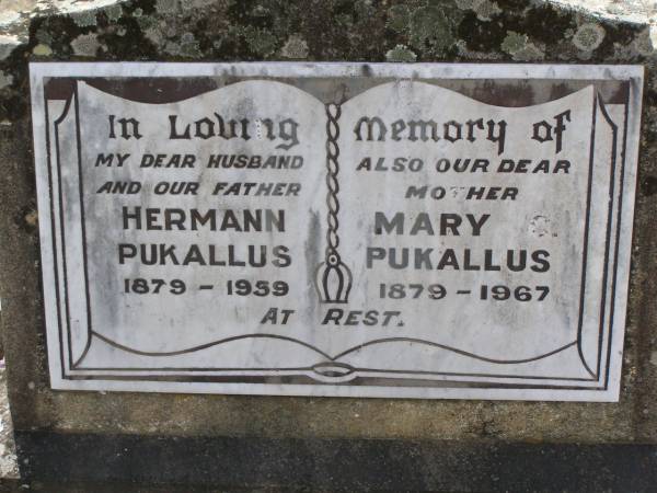 Hermann PUKALLUS, husband father,  | 1879 - 1959;  | Mary PUKALLUS, mother,  | 1879 - 1967;  | Douglas Lutheran cemetery, Crows Nest Shire  | 