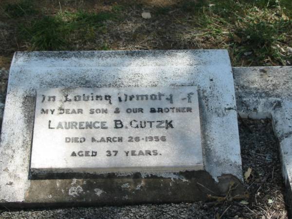 Laurence B. GUTZKE,  | son brother,  | died 26 March 1956 aged 37 years;  | Dugandan Trinity Lutheran cemetery, Boonah Shire  | 