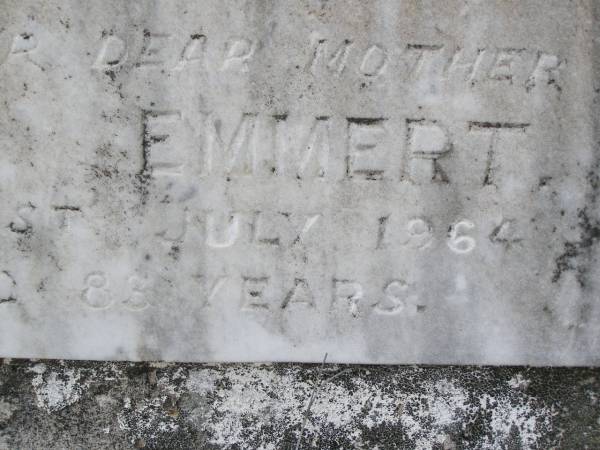 Otto W. EMMERT, husband father,  | died 28 April 1938 aged 58 years;  | Emily EMMERT, mother,  | died 31 July 1964 aged 83 years;  | Emu Creek cemetery, Crows Nest Shire  | 