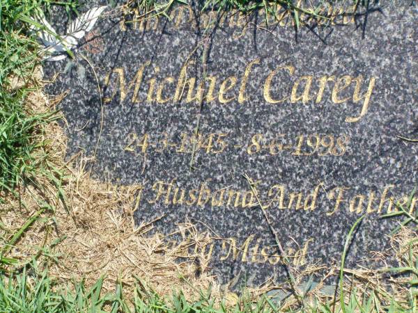 Michael CAREY,  | 244-3-1945 - 8-6-1998,  | husband father;  | Gleneagle Catholic cemetery, Beaudesert Shire  | 