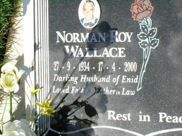 Norman Roy WALLACE,  | 27-9-1934 - 17-4-2000,  | husband of Enid,  | father father-in-law;  | Gleneagle Catholic cemetery, Beaudesert Shire  | 