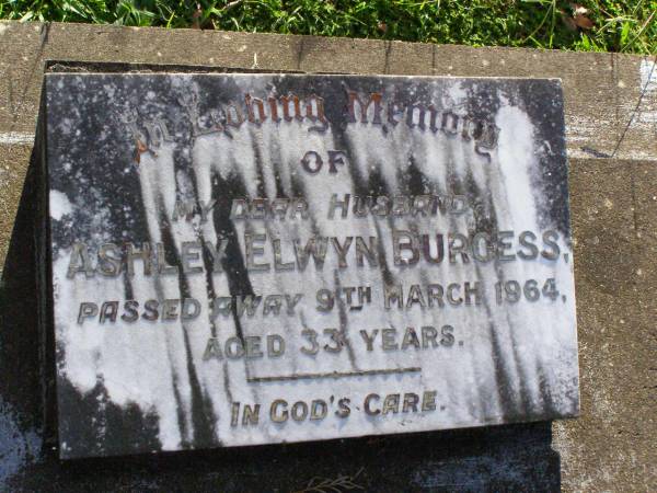 Ashley Elwyn BURGESS, husband,  | died 9 March 1964 aged 33 years;  | Gleneagle Catholic cemetery, Beaudesert Shire  | 