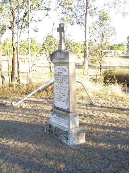 Michael Augustine JOHNSON,  | husband of Mary JOHNSON,  | native of Clarence Town NSW,  | died 12 Aug 1906 aged 57 years;  | Robert John JOHNSON, son brother,  | died 24 Aug 1916 ageed 35 years;  | Mary Thresa JOHNSON,  | wife of Michael JOHNSON,  | died 26 Jan 1925 aged 67 years;  | Helidon Catholic cemetery, Gatton Shire  | 