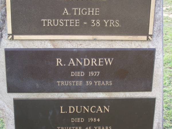 Helidon Cemetery Trustees memorial;  | A. TIGHE, trustee 38 years;  | R. ANDREW, died 1977, trustee 39 years;  | L. DUNCAN, died 1984, trustee 45 years;  | U.C. (Dooley) PAROZ, died 1987, trustee 31 years;  | C. GREER, died 1987, trustee 40 years;  | W.A. BATEMAN, died 1989, trustee 33 years;  | B.A. HAWLEY, died 1990, trustee 13 years;  | Helidon General cemetery, Gatton Shire  | 