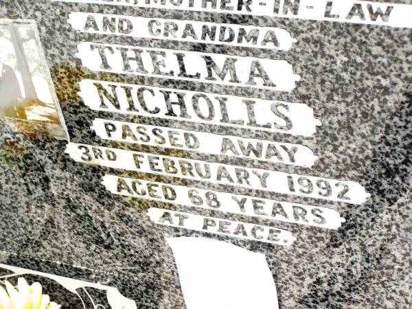 Reginald Paulin NICHOLLS,  | husband father,  | died 14 March 1962 aged 58 years;  | Thelma NICHOLLS,  | mother mother-in-law grandma,  | died 3 Feb 1992 aged 68 years;  | Jandowae Cemetery, Wambo Shire  | 