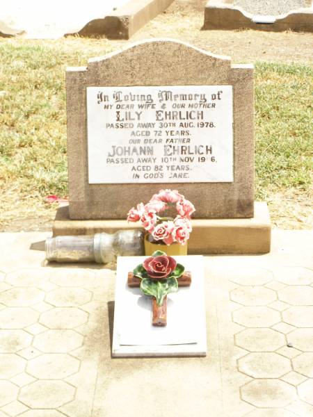 Lily EHRLICH,  | wife mother,  | died 30 Aug 1978 aged 72 years;  | Johann EHRLICH,  | father,  | died 10 Nov 1986 aged 82 years;  | from Myrtle & Cliff,  | Judy & Ted, Helen & John, Nevell & Joan,  | Lyn & Ross & grandchildren;  | Jandowae Cemetery, Wambo Shire  | 