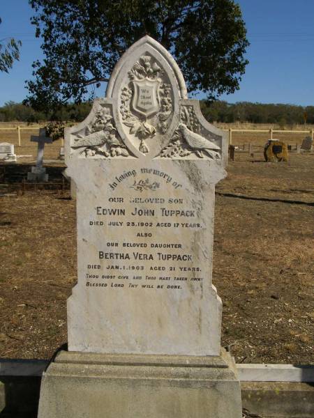 Edwin John TUPPACK,  | son,  | died 23 July 1902 aged 17 years;  | Bertha Vera TUPPACK,  | daughter,  | died 1 Jan 1903 aged 21 years;  | Jondaryan cemetery, Jondaryan Shire  | 