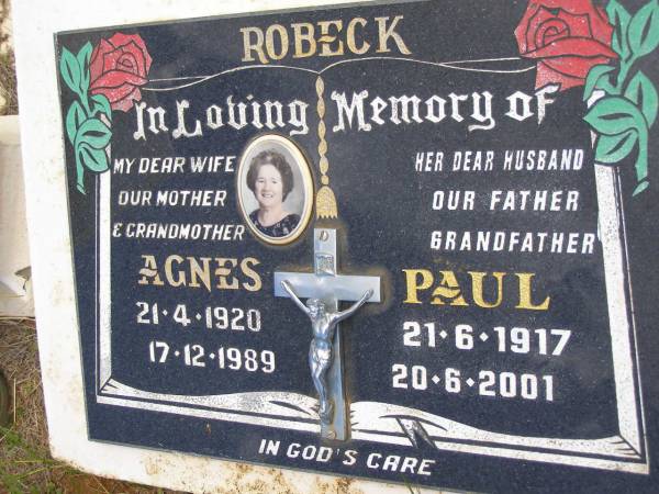 Agnes ROBECK,  | wife mother grandmother,  | 21-4-1920 - 17-12-1989;  | Paul ROBECK,  | husband father grandfather,  | 21-6-1917 - 20-6-2001;  | Kandanga Cemetery, Cooloola Shire  | 