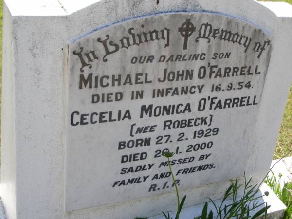 Michael John O'FARRELL, son,  | died infancy 16-9-54;  | Cecelia Monica O'FARRELL (nee ROBECK),  | born 27-2-1929 died 26-1-2000;  | Kandanga Cemetery, Cooloola Shire  | 