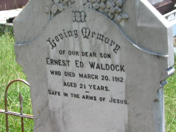 Ernest Ed WALDOCK,  | son,  | died 20 March 1912 aged 2 1/2 years;  | E.L. (Maid) WALDOCK,  | wife mother,  | died 1 July 1948 aged 52 years;  | A.M. (Fred) WALDOCK,  | father grandfather,  | died 3 Nov 1975 aged 78 years;  | Kilkivan cemetery, Kilkivan Shire  | 