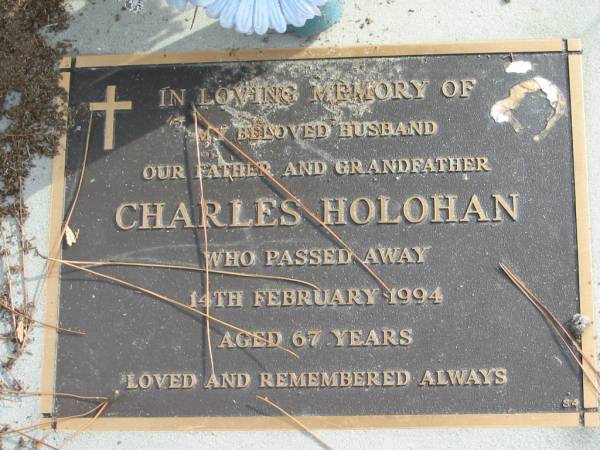 Charles HOLOHAN,  | died 14 Fb 1994 aged 67 years,  | husband father grandfather;  | Logan Village Cemetery, Beaudesert Shire  | 