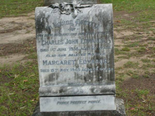 Charles John EDWARDS,  | husband father,  | died 1 June 1938 aged 69 years;  | Margaret EDWARDS,  | mother,  | died 15 Nov 1945 aged 70 years;  | Lower Coomera cemetery, Gold Coast  | 