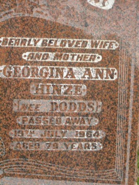 August Carl Friederich HINZE,  | husband father,  | died 1 July 1949 aged 69 years;  | Georgina Ann HINZE (nee DODDS),  | wife mother,  | died 19 July 1964 aged 79 years;  | Lower Coomera cemetery, Gold Coast  | 
