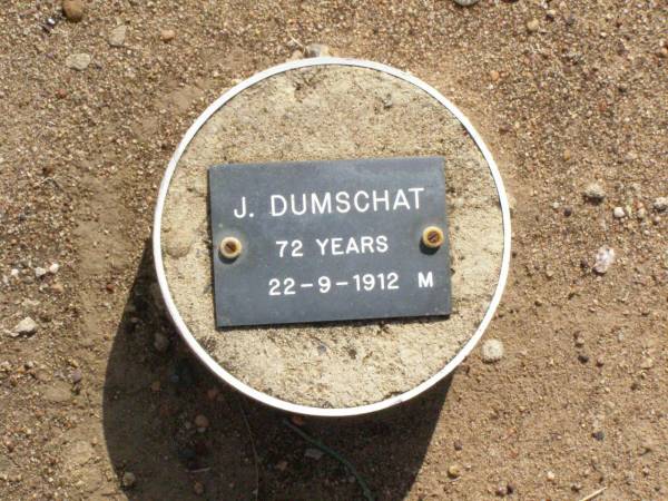 J. DUMSCHAT, male,  | died 22-9-1912 aged 72 years;  | Ma Ma Creek Anglican Cemetery, Gatton shire  | 