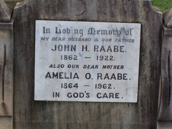 John H. RAABE, husband father,  | 1862-1922;  | Amelia O. RAABE, mother,  | 1864-1962;  | Ma Ma Creek Anglican Cemetery, Gatton shire  | 