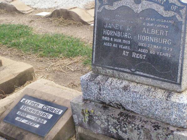 Albert HORNBURG, husband father,  | died 23 Mar 1939 aged 60 years;  | Janet M. HORNBURG, mother,  | died 8 Mar 1965 aged 82 years;  | Alfred George HORNBURG,  | 1902 - 1986;  | Ma Ma Creek Anglican Cemetery, Gatton shire  | 