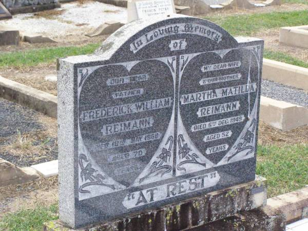 Frederick William REIMANN, father,  | died 18 May 1969 aged 70 years;  | Martha Matilda REIMANN, wife mother,  | died 6 Dec 1949 aged 52 years;  | Ma Ma Creek Anglican Cemetery, Gatton shire  | 