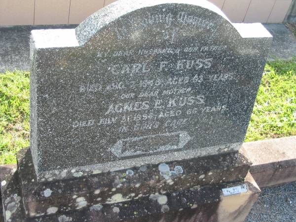 Carl F. KUSS,  | died 7 Aug 1948 aged 63 years;  | Agnes E. KUSS,  | died 31 July 1956 aged 66 years;  | Marburg Lutheran Cemetery, Ipswich  | 