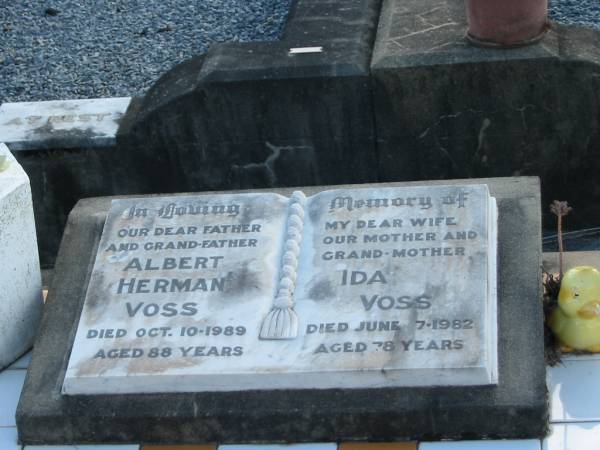 Albert Herman VOSS, father grandfather,  | died 10 Oct 1989 aged 88 years;  | Ida VOSS< wife mother grandmother,  | died 7 June 1982 aged 78 years;  | Marburg Lutheran Cemetery, Ipswich  | 