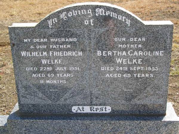 Wilhelm Friedrich WELKE,  | husband father,  | died 22 July 1951 aged 69 years 11 months;  | Bertha Caroline WELKE,  | mother,  | died 24 Sept 1953 aged 69 years;  | Meringandan cemetery, Rosalie Shire  | 