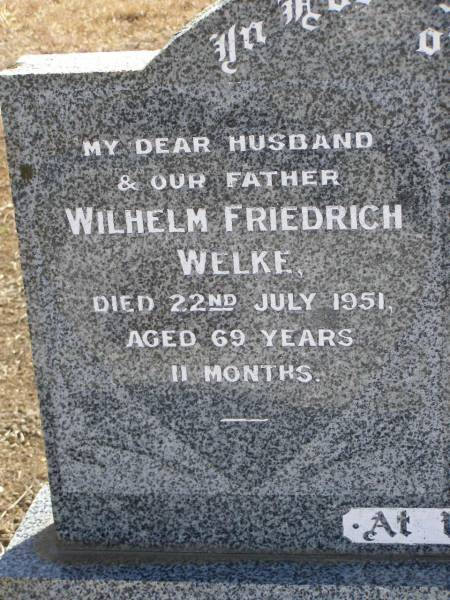 Wilhelm Friedrich WELKE,  | husband father,  | died 22 July 1951 aged 69 years 11 months;  | Bertha Caroline WELKE,  | mother,  | died 24 Sept 1953 aged 69 years;  | Meringandan cemetery, Rosalie Shire  | 