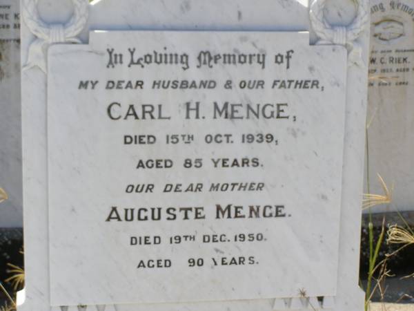 Carl H. MENGE,  | husband father,  | died 15 Oct 1939 aged 85 years;  | Auguste MENGE,  | mother,  | died 19 Dec 1950 aged 90 years;  | Milbong St Luke's Lutheran cemetery, Boonah Shire  | 