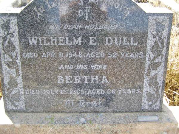 Wilhelm E. DULL,  | husband,  | died 11 Apr 1948 aged 52 years;  | Bertha,  | wife,  | died 15 July 1965 aged 66 years;  | Milbong St Luke's Lutheran cemetery, Boonah Shire  | 