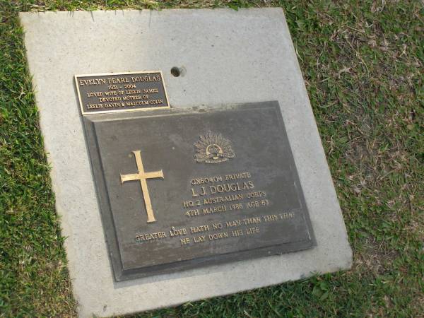 L.J. DOUGLAS,  | died 4 March 1986 aged 63 years;  | Evelyn Pearl DOUGLAS,  | wife of Leslie James,  | mother of Leslie Gavin & Malcolm Colin;  | Mudgeeraba cemetery, City of Gold Coast  | 