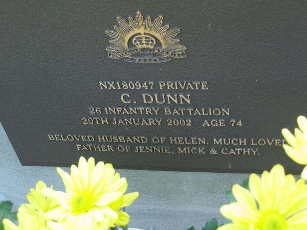 C. DUNN,  | died 20 Jan 2002 aged 74 years,  | husband of Helen,  | father of Jennie, Mick & Cathy;  | Mudgeeraba cemetery, City of Gold Coast  | 