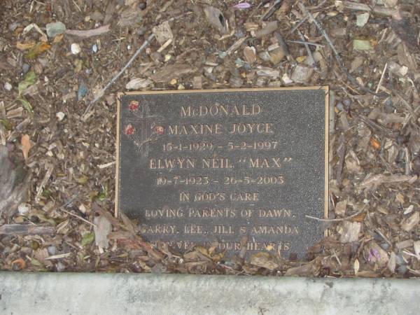 Maxine Joyce MCDONALD,  | 15-1-1929 - 5-2-1997;  | Elwyn Neil (Max) MCDONALD,  | 19-7-1923 - 26-5-2003;  | parents of Dawn, Garry, Lee, Jill & Amanda;  | Mudgeeraba cemetery, City of Gold Coast  | 