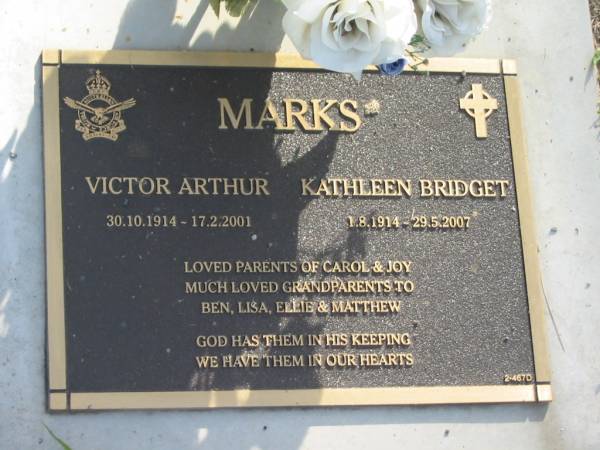Victor Arthur MARKS,  | 30-10-1914 - 17-2-2001;  | Kathleen Bridget MARKS,  | 1-8-1914 - 29-5-2007;  | parents of Carol & Joy,  | grandparents of Ben, Lisa, Ellie & Matthew;  | Mudgeeraba cemetery, City of Gold Coast  | 