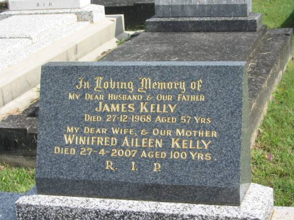 James KELLY,  | husband father,  | died 27-12-1968 aged 57 years;  | Winifred Aileen KELLY,  | wife mother,  | died 27-4-2007 aged 100 years;  | Murwillumbah Catholic Cemetery, New South Wales  | 
