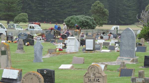 (local volunteers digging the grave of a local who died a day or two before)  | Norfolk Island Cemetery  | 