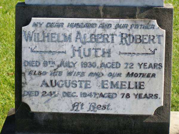 Wilhelm Albert Robert HUTH,  | died 9 July 1930 aged 72 years,  | husband father;  | Auguste Emelie,  | wife mother,  | died 24 Dec 1947 aged 78 years;  | Pimpama Island cemetery, Gold Coast  | 