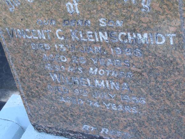 Vincent C. KLEINSCHMIDT,  | son,  | died 13 Jan 1938 aged 25 years;  | Wilhelmina,  | mother,  | died 9 July 1956 aged 74 years;  | Pimpama Island cemetery, Gold Coast  | 