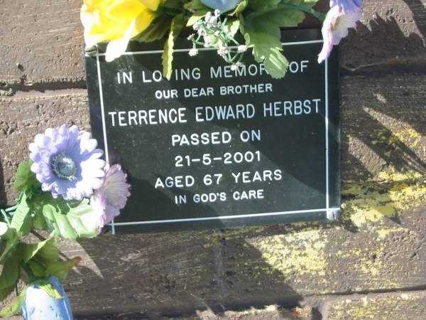 Terrence Edward HERBST,  | brother,  | died 21-5-2001 aged 67 years;  | Pimpama Island cemetery, Gold Coast  | 