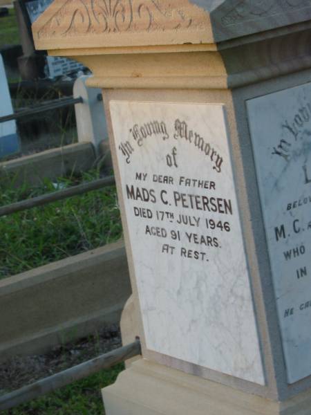 Mads C. PETERSEN,  | faher,  | died 17 July 1946 aged 91 years;  | Lilley,  | daughter of M.C. & M. PETERSEN,  | died 4 May 1916 in 25th year;  | Matilda PETERSEN,  | wife mother,  | died 17 Oct 1934 aged 75 years;  | Bald Hills (Sandgate) cemetery, Brisbane  | 