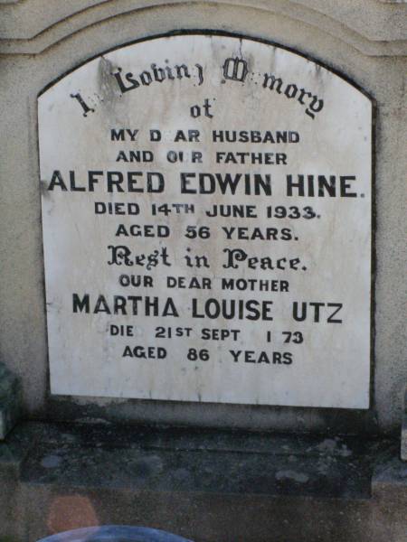Alfred Edwin HINE, husband father,  | died 14 June 1933 aged 56 years;  | Martha Louise UTZ, mother,  | died 21 Sept 1973 aged 86 years;  | Tarampa Apostolic cemetery, Esk Shire  | 
