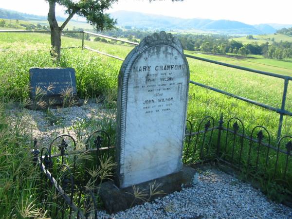 Mary CRAWFORD,  | wife of John WILSON,  | died Casino 16 March 1905 aged 78 years;  | John WILSON,  | died 2 Oct 1905 aged 79 years;  | Wilson Family Private Cemetery, The Risk via Kyogle, New South Wales  | 