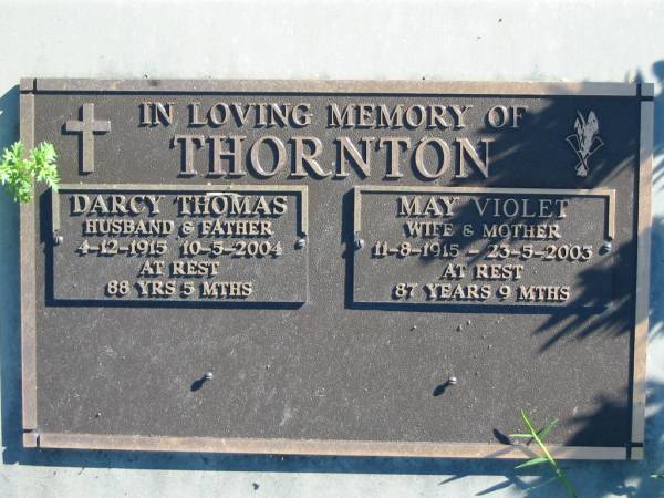 THORTON;  | Darcy Thomas, husband father,  | 4-12-1915 - 10-5-2004, 88 years 5 months;  | May Violet, wife mother,  | 11-8-1915 - 23-5-2003, 87 years 9 months;  | Woodford Cemetery, Caboolture  | 
