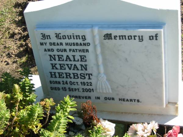 Neale Kevan HERBST,  | husband father,  | born 24 Oct 1922 died 15 Sept 2001;  | Woodford Cemetery, Caboolture  | 