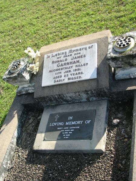 Ronald James GARNHAM, son,  | accidentally killed 11 Jan 1951 aged 22 years;  | Mary Jane GARNHAM,  | died 1 April 1969 aged 80 years;  | Woodford Cemetery, Caboolture  | 