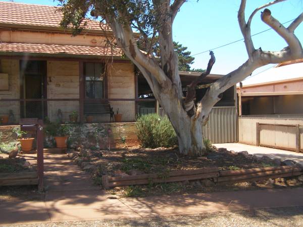 Houses covered in red dust,  | Whyalla,  | South Australia  | 